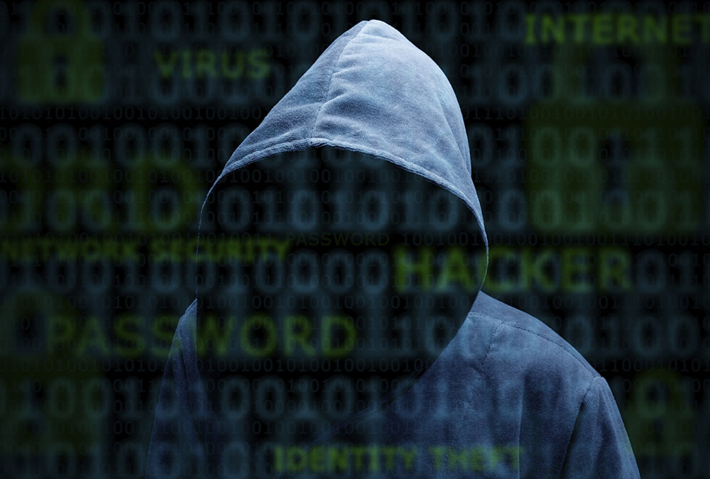 Hooded silhouette of a hacker