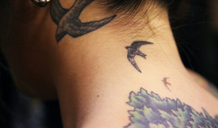 Наука: Ученые из Университета Алабамы выяснили, что от гриппа спасают татуировки